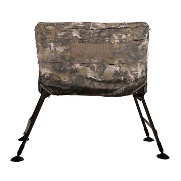 Momarsh Invisi Lab blind side view shows adjustable legs on rugged terrain.