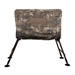 Momarsh Invisi Lab blind side view shows adjustable legs on rugged terrain.