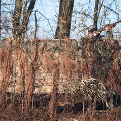 Momarsh InvisiGrass weatherproof material resists rain and wind for season-long use.