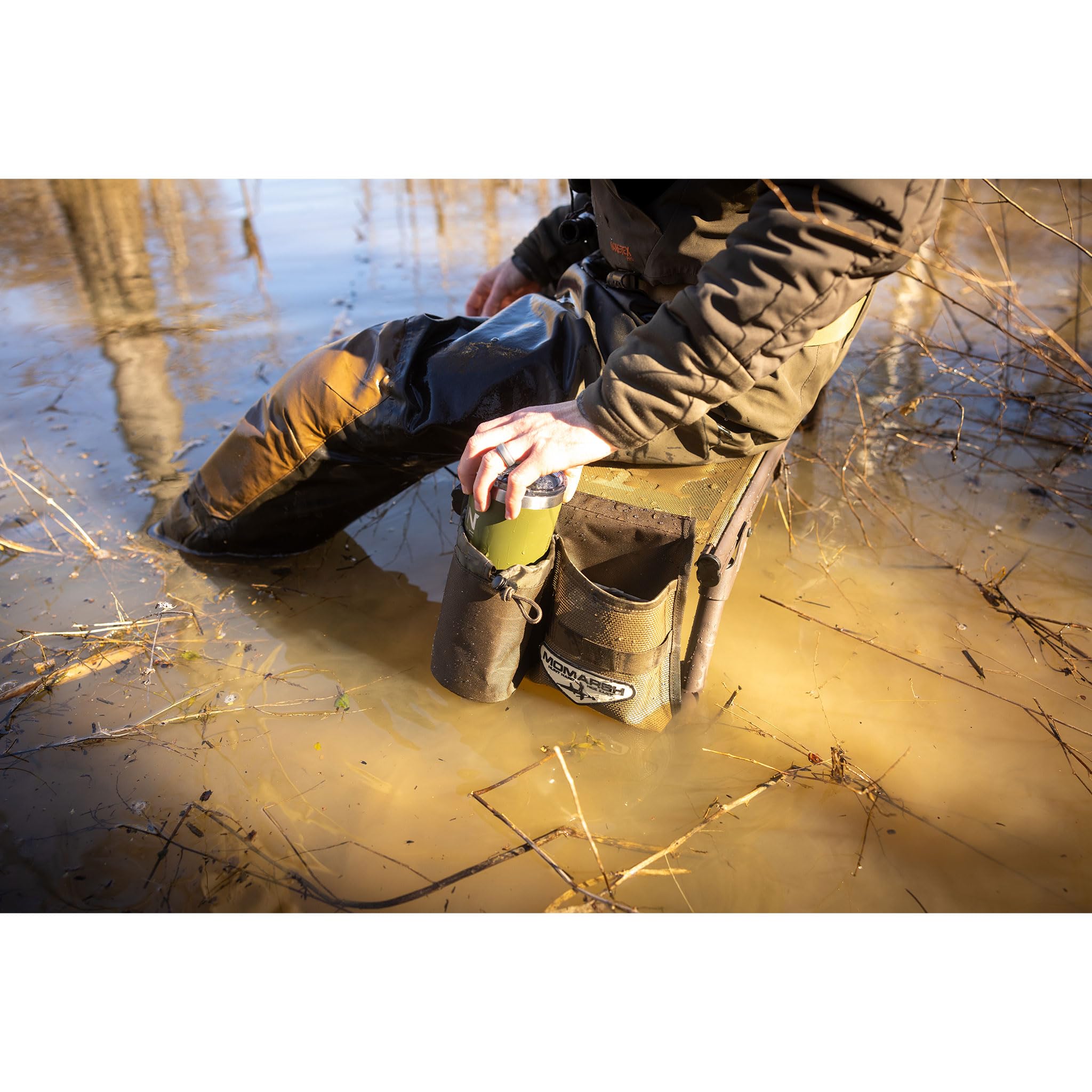 Momarsh weather-proof bench seat shown in rugged hunting setting.