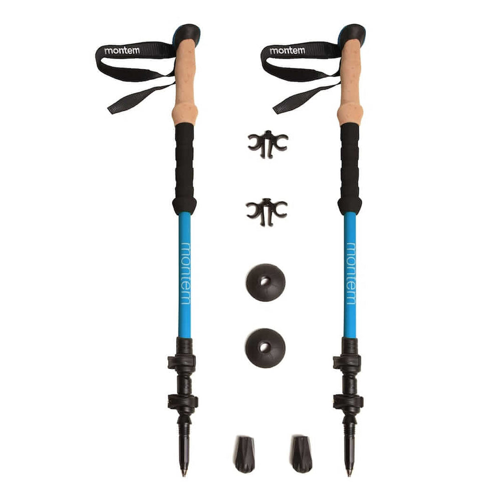 Montem Ultra Light trekking poles folded compactly for easy packing in luggage.