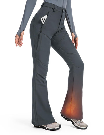 Moosehill women's snow ski pants outer layer repels snow and light rain for reliable protection.