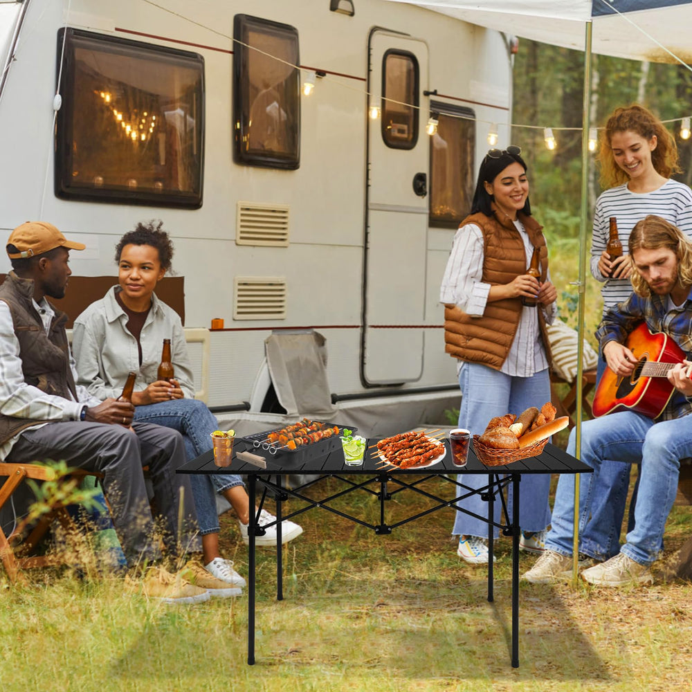 Rolled-up Moosinily camping table for easy portability and storage