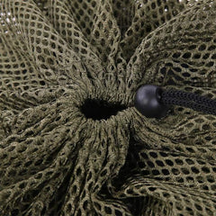 Close-up of MOPHOEXII Decoy Bag mesh material for durability and breathability.
