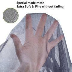 Hat with mesh net folded away on top for sun shade