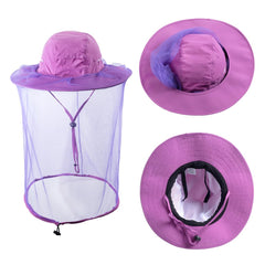 Purple mosquito netting hat worn by a person outdoors
