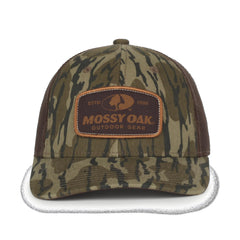 Side view showing mesh back and adjustable plastic snapback