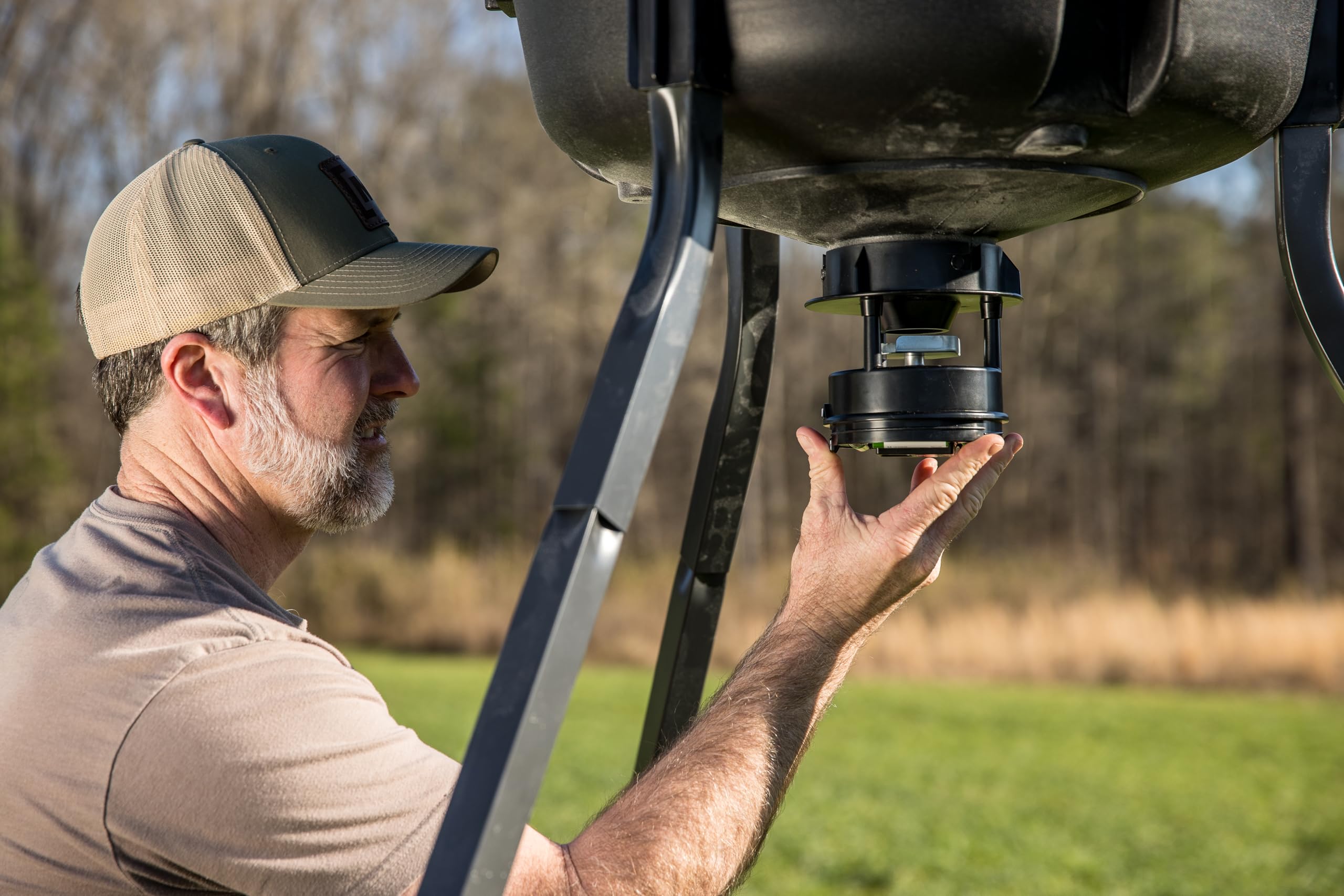 Moultrie All-In-One II Snap Lock adapter for tool-free installation.