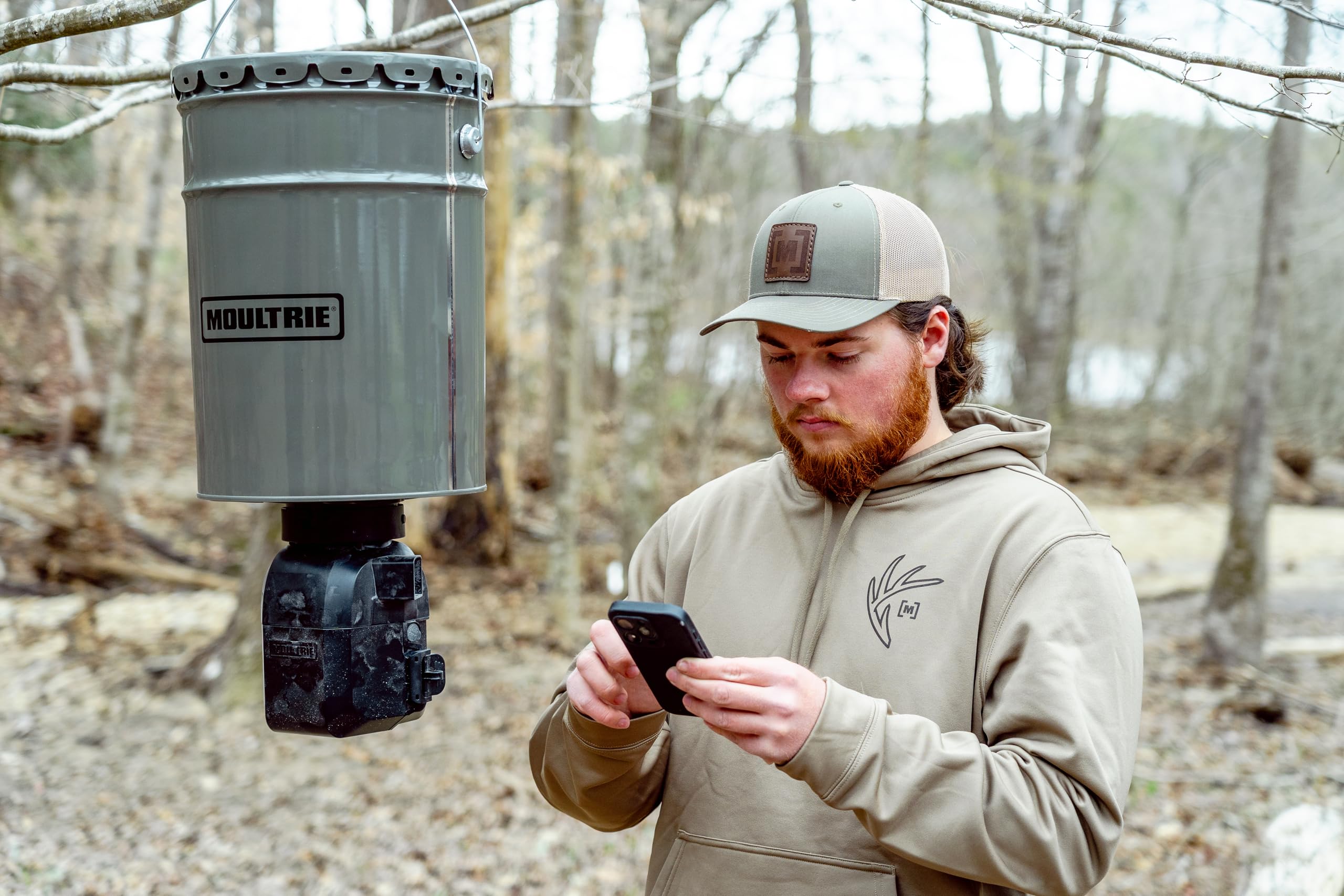 Graphic showing Moultrie Connect Bluetooth app control for the feeder.