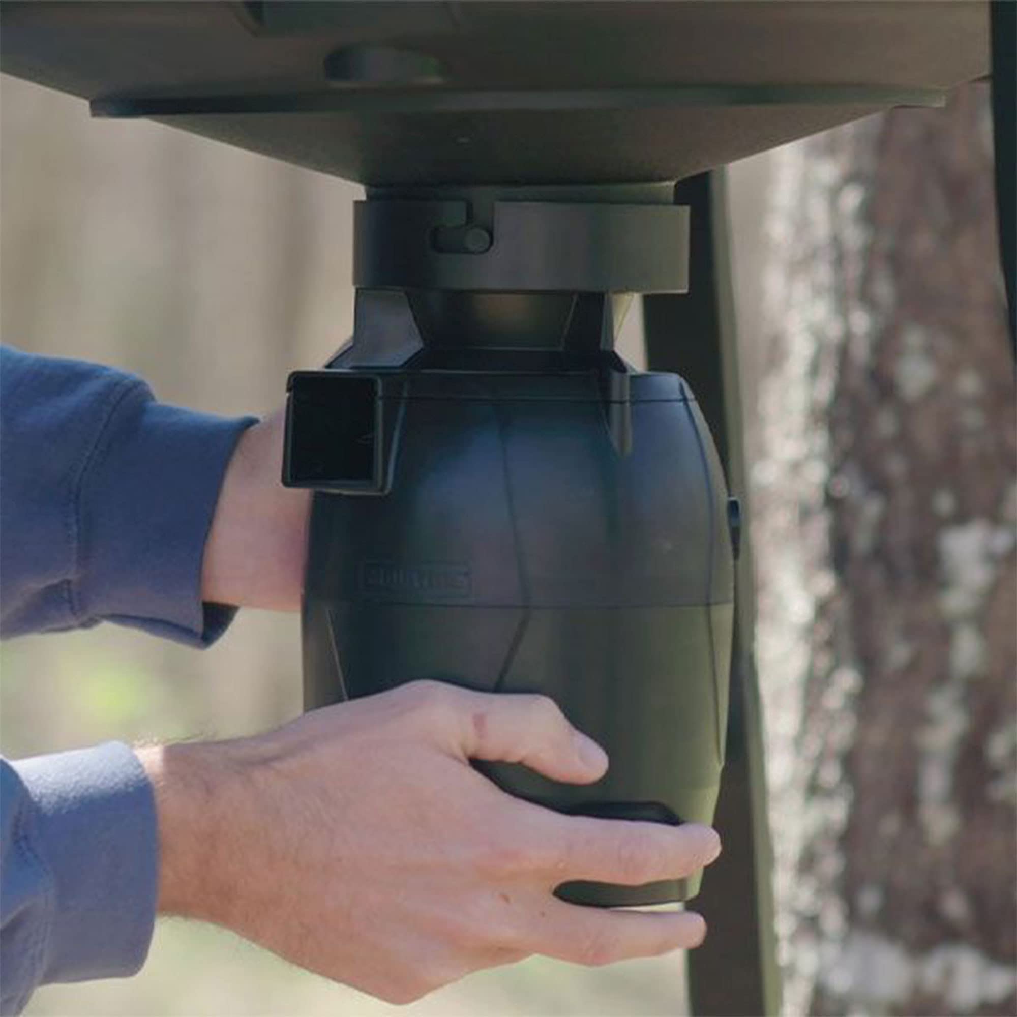 Moultrie quick-lock mounting system secures the feeder to a compatible hopper.