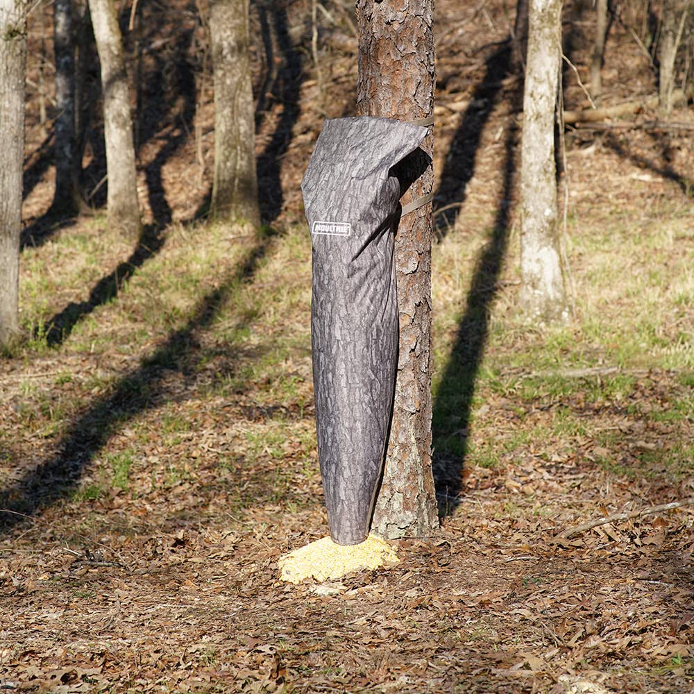 Feeder strapped to a tree for setup