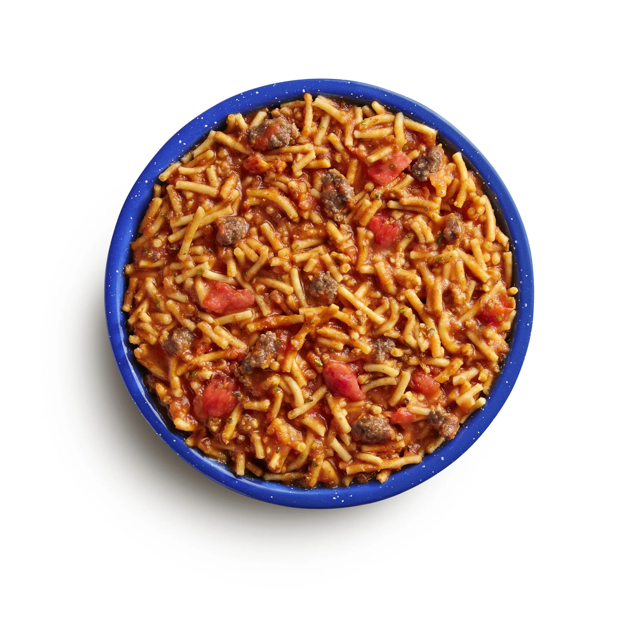 Mountain Essentials spaghetti beef marinara steaming in a bowl outdoors