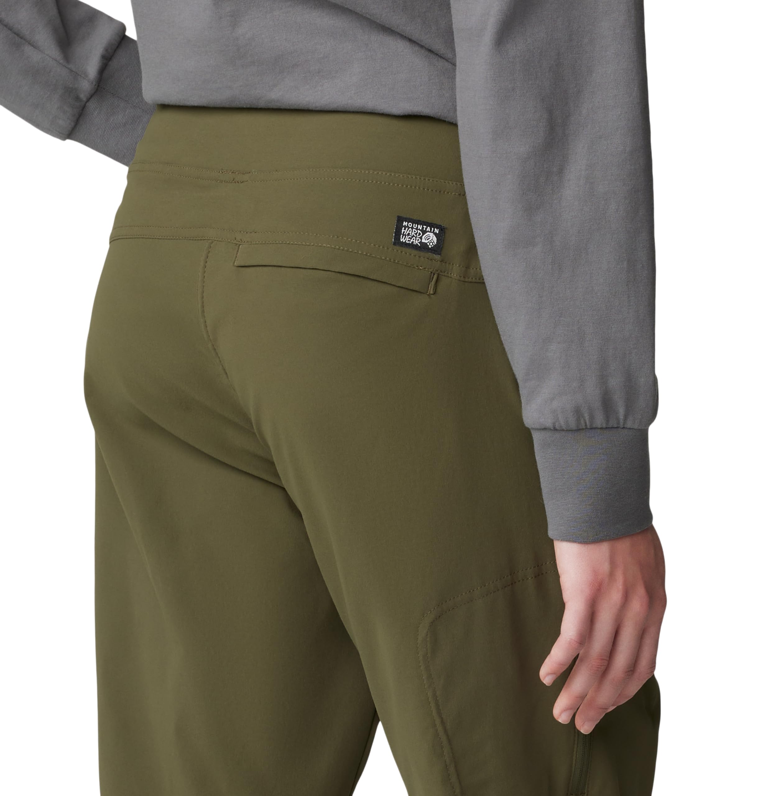 Mountain Hardwear Dynama Ankle Pant zip pocket highlights secure storage during hikes.