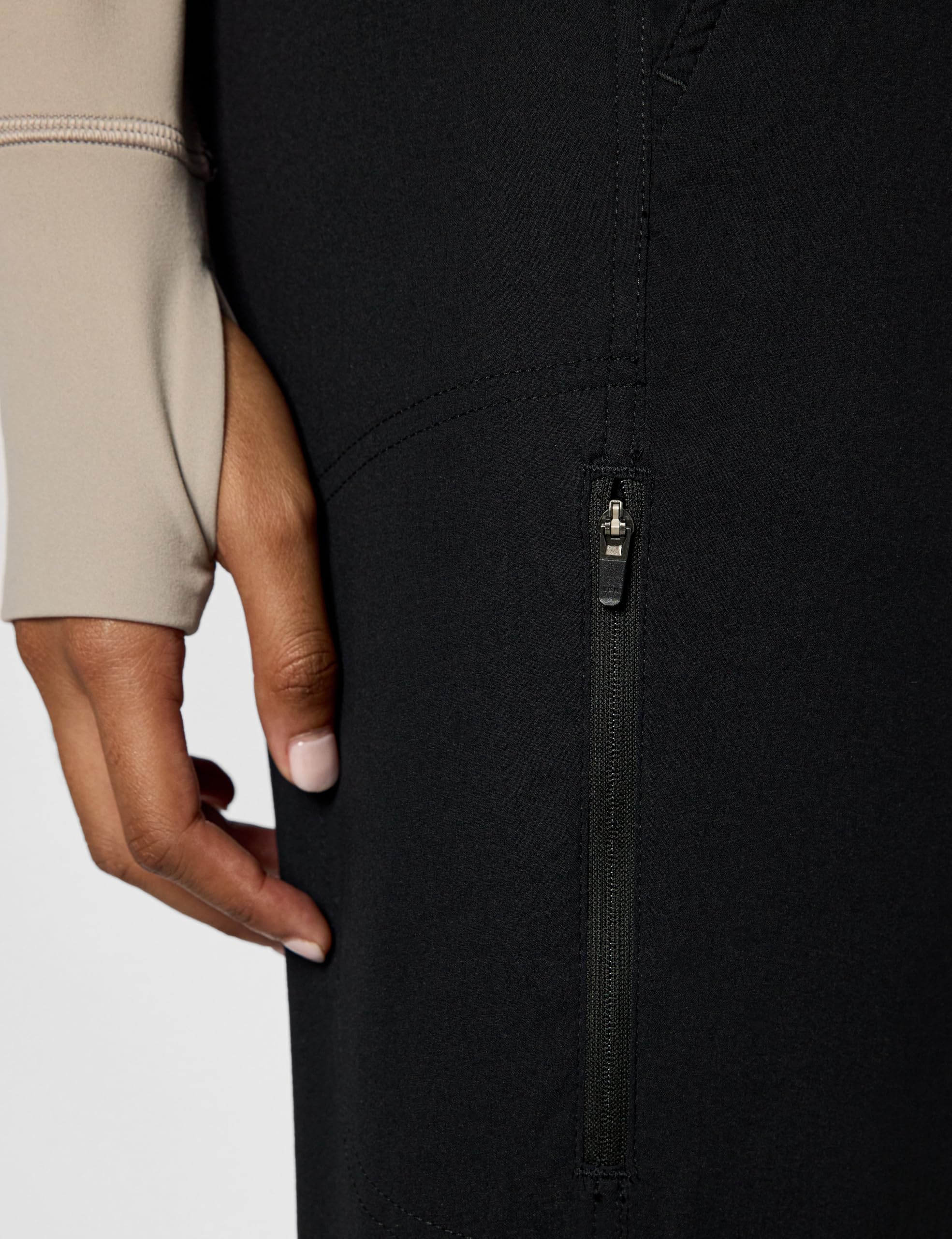 Mountain Hardwear Dynama Capri back view demonstrates lightweight, flexible movement.