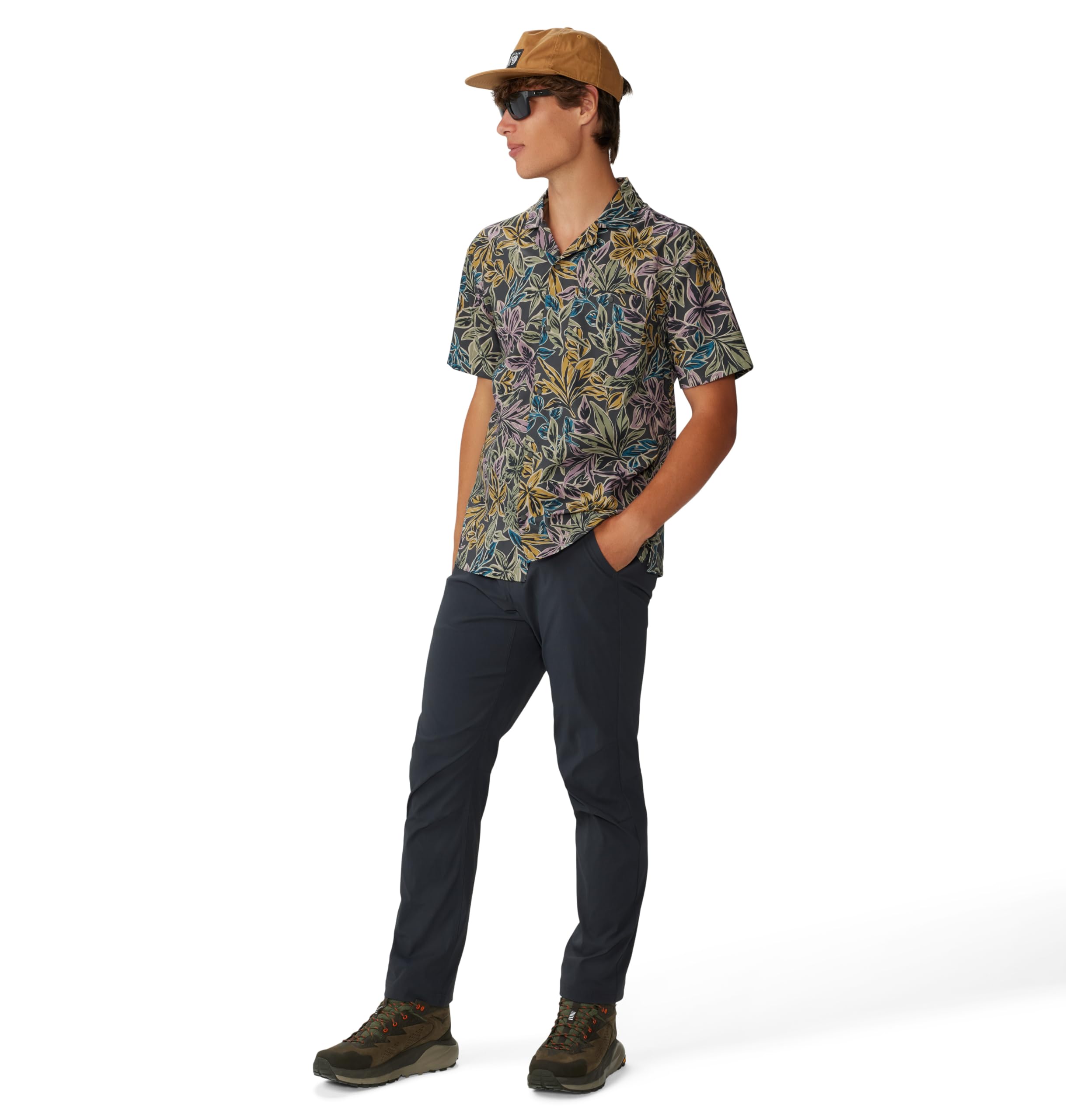 Mountain Hardwear Men's Explore Pant action shot for trail-to-crag versatility