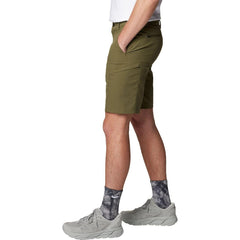 Mountain Hardwear AP Cargo Short cargo thigh pockets in action during climb.