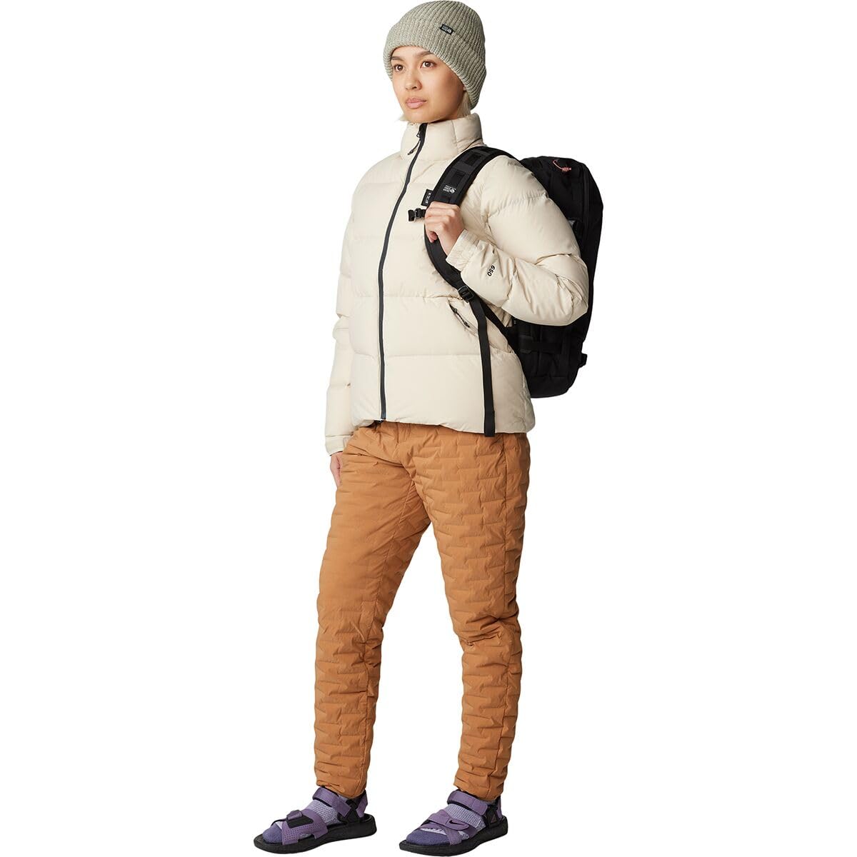 Mountain Hardwear StretchDown Light Pant copper clay wearing-activity captures alpine hiking comfort and warmth