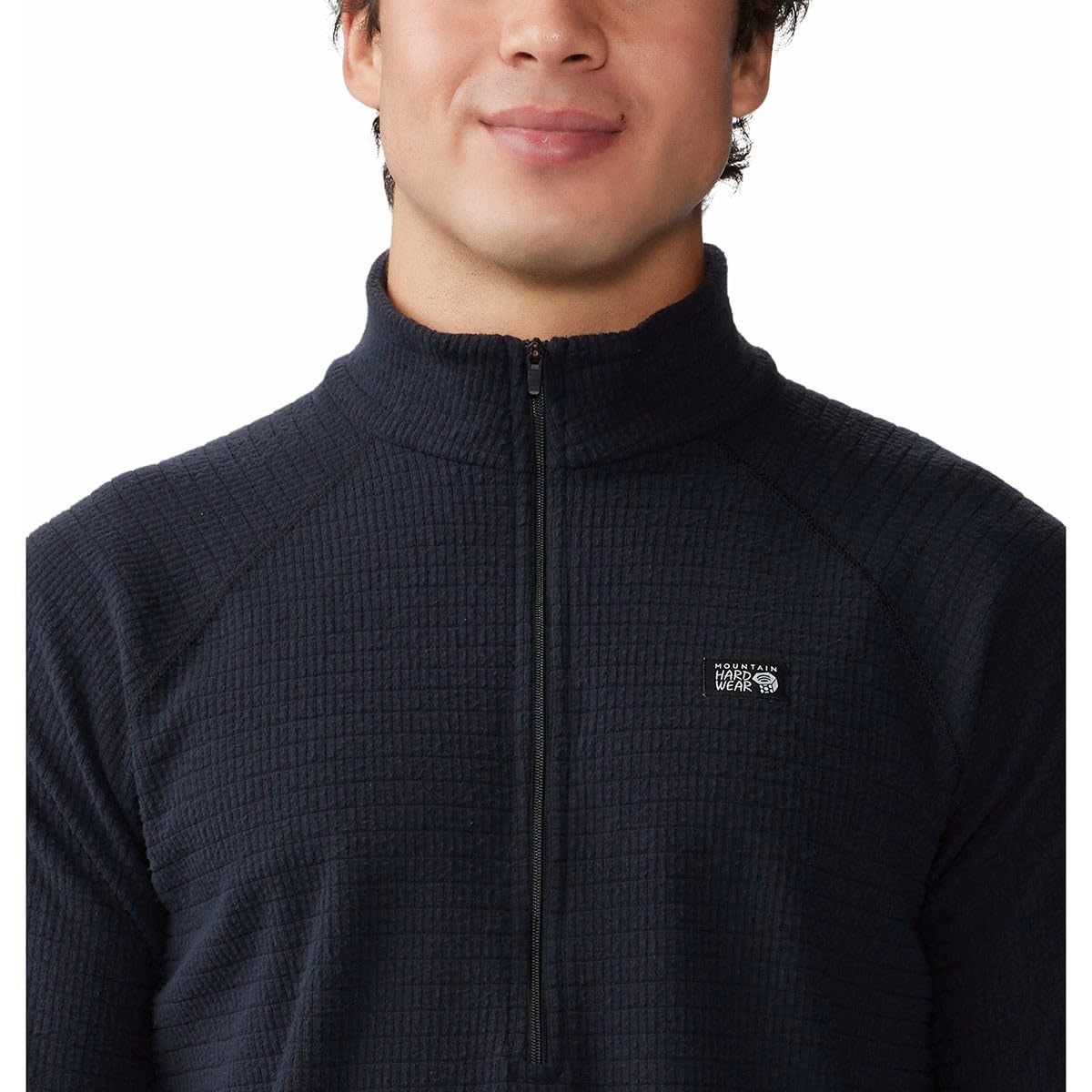 Mountain Hardwear Summit Grid drop-tail hem adds coverage during movement.