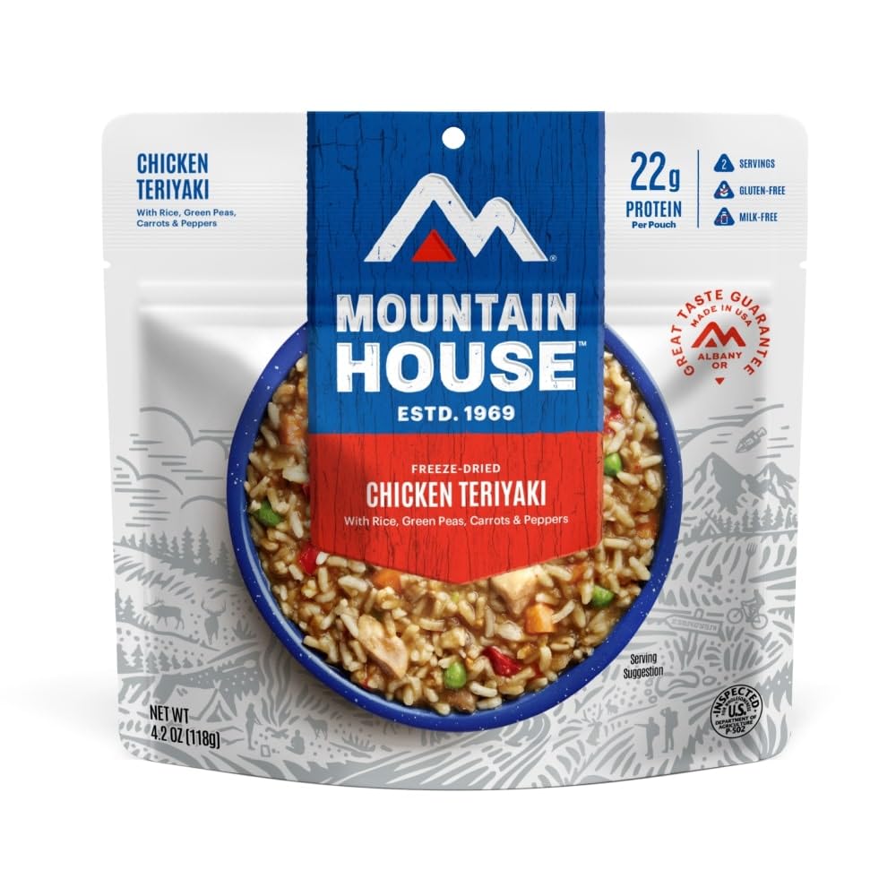 Mountain House Chicken Teriyaki ready-to-serve pouch on camping table.