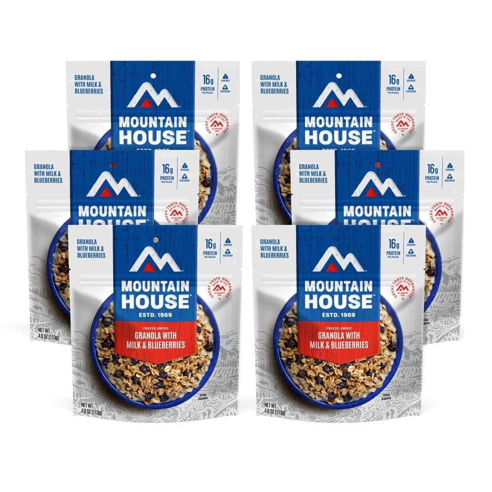 Mountain House granola with milk and blueberries pouch-prepare demonstrates quick trail-ready meal.