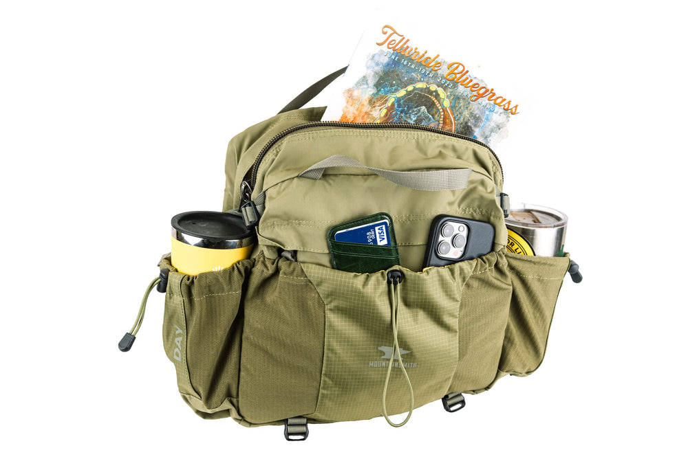 Mountainsmith Day Lumbar Pack olive-green fabric demonstrates rugged durability