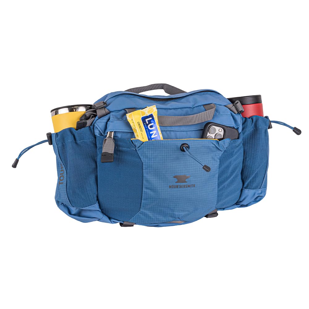Mountainsmith Tour Lumbar Pack in-use on a hike shows durable construction