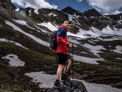 MOUNTAINTOP hiking backpack side view highlights side pockets for quick access on trails.