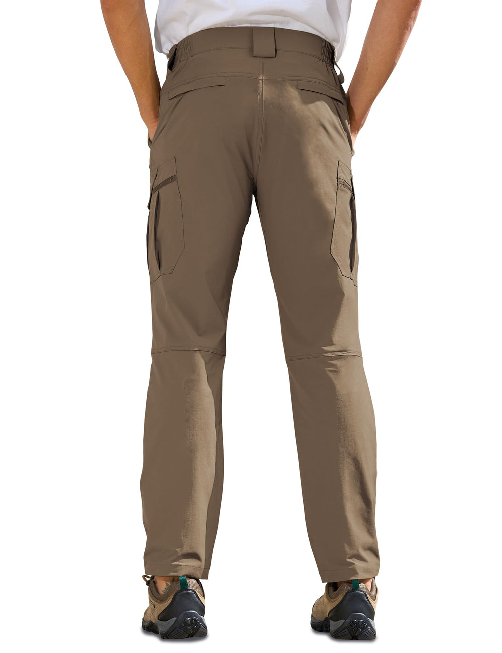 MOURCE hiking pants with quick-dry fabric demonstrated on a rainy trail.
