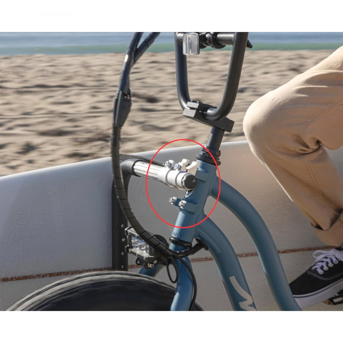 Moved By Bikes longboard carrier for 12-foot boards with quick-release design for effortless mounting.
