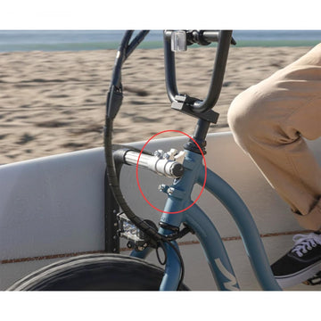 Moved By Bikes longboard carrier for 12-foot boards with quick-release design for effortless mounting.