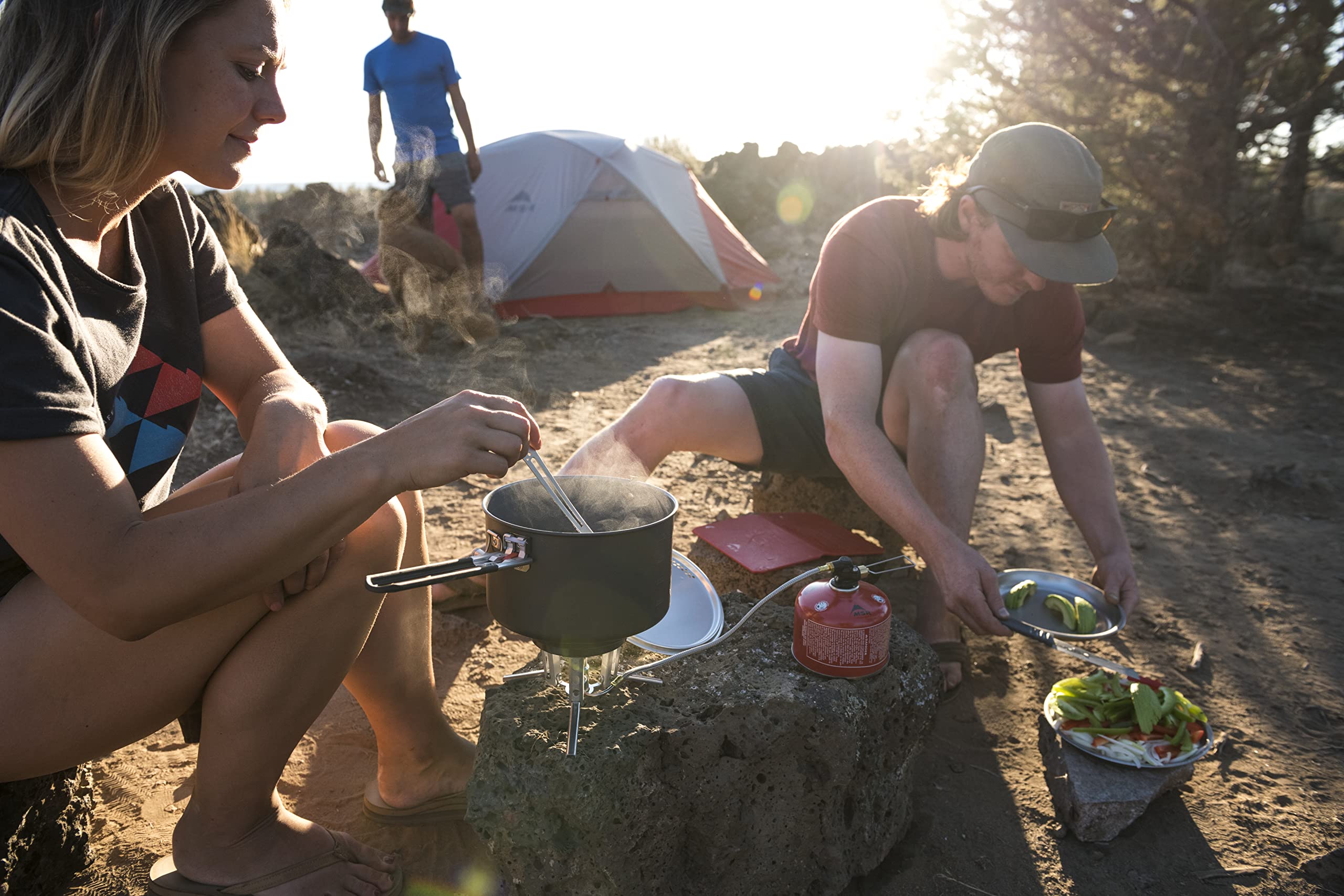 MSR Alpine Long Camping Tool Spoon pictured with stand-up pouch meals for camp cooking.