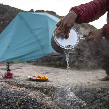 MSR ceramic pot lid doubles as a strainer for quick draining.
