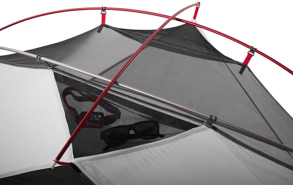 MSR Elixir gear loft and end pockets keep essentials handy.