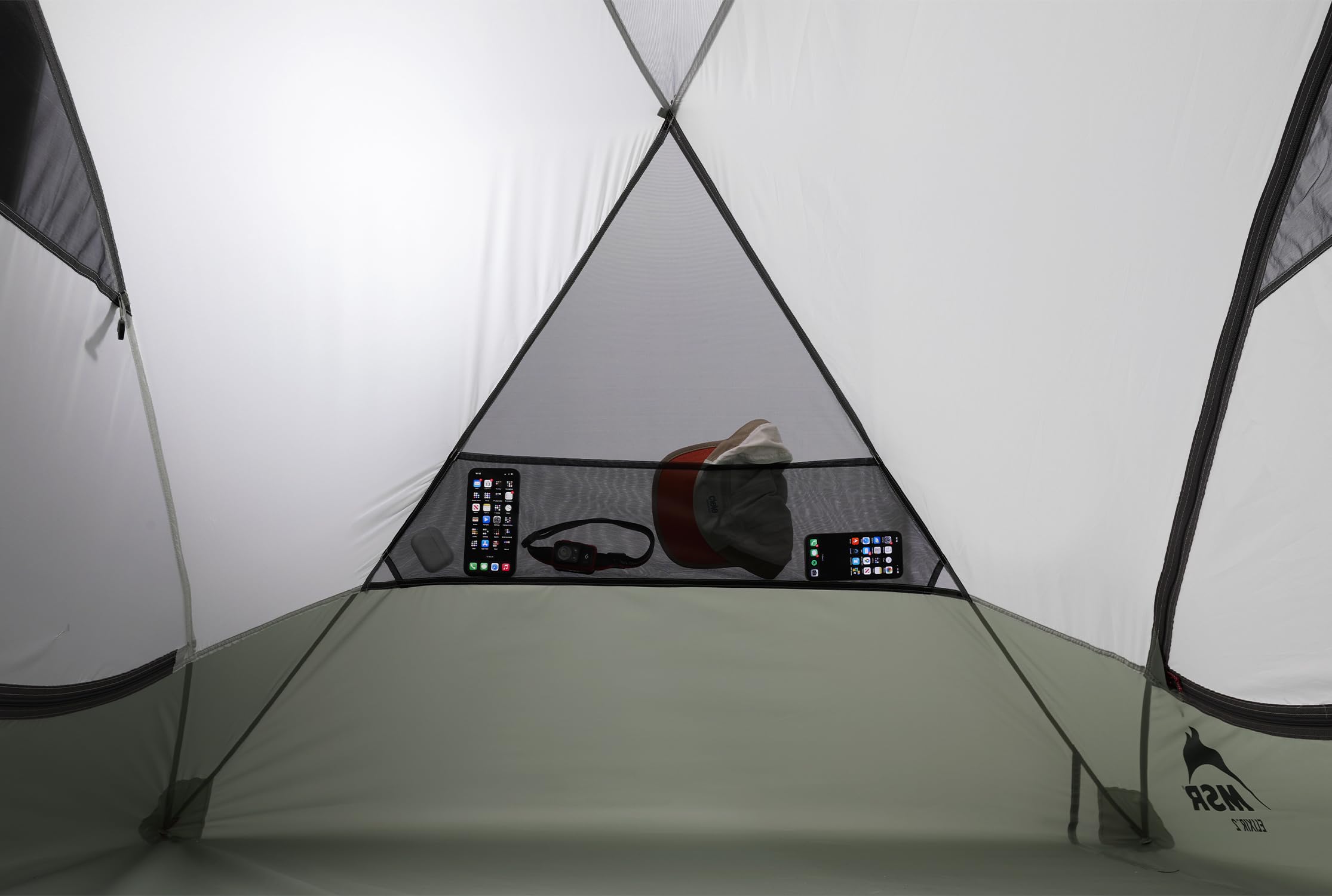 MSR Elixir gear loft and pockets help organize essentials in camp.