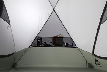 MSR Elixir gear loft and pockets help organize essentials in camp.