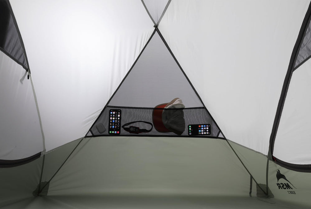 MSR Elixir gear loft and pockets help organize essentials in camp.