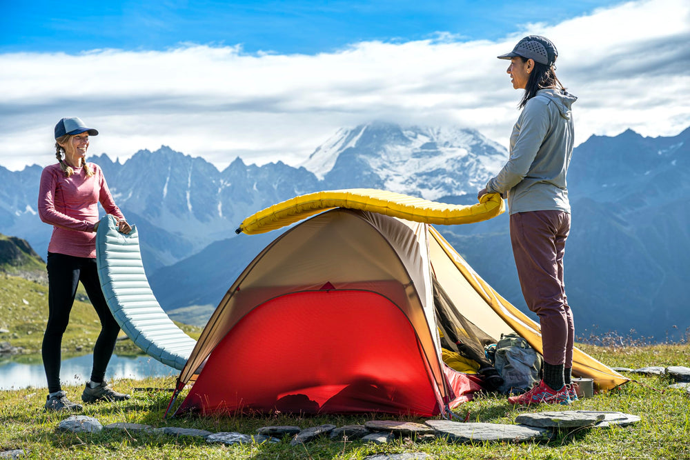 MSR Freelite cable-port pockets manage cords for charging devices in camp