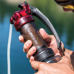 MSR MiniWorks EX filter cartridge close-up shows replaceable ceramic and carbon core for clean water.