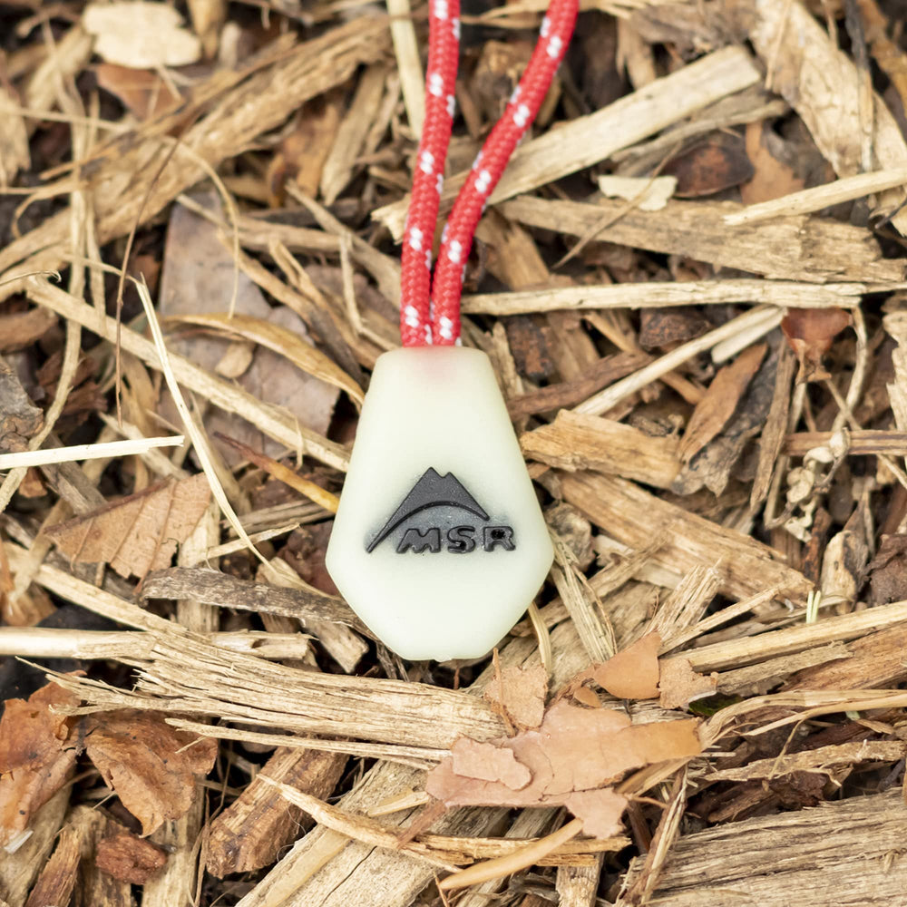 MSR Night Glow zipper pull glowing in dark for quick tent access