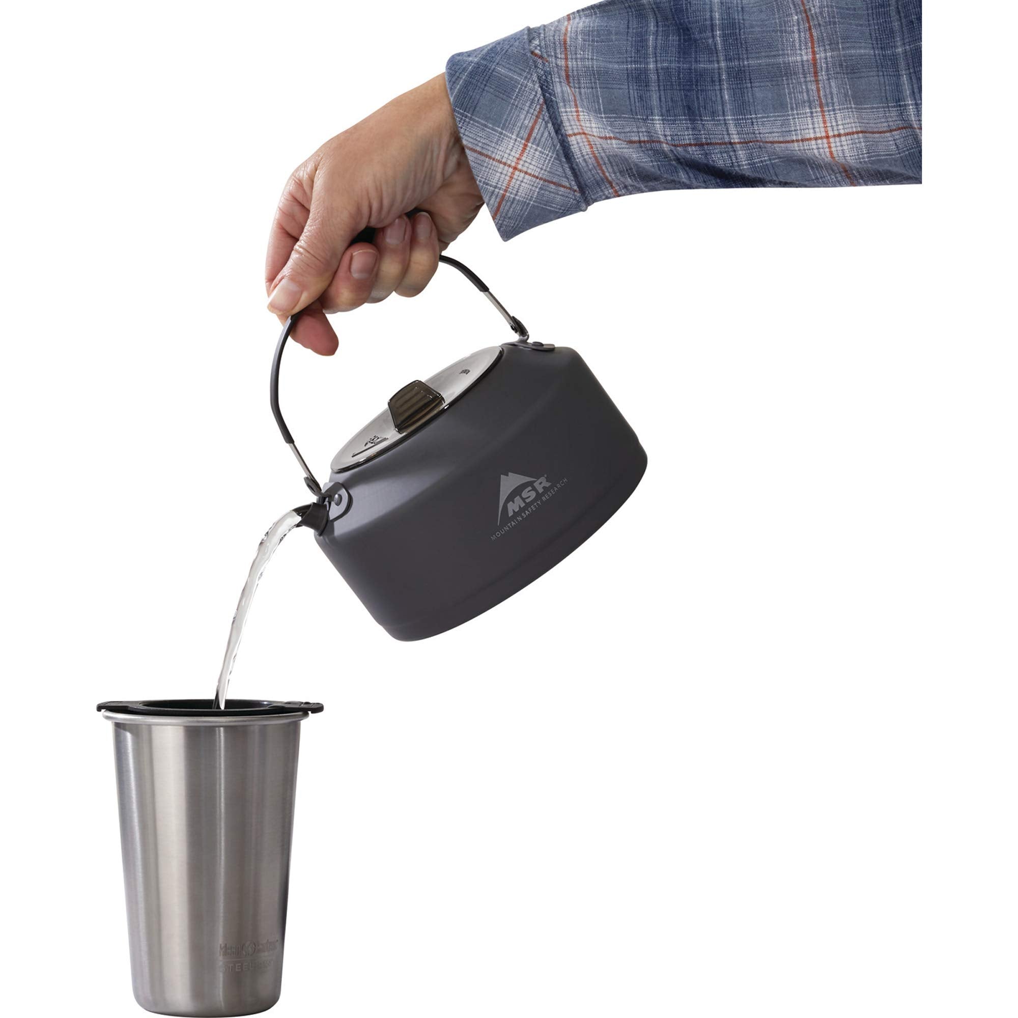 MSR Pika teapot stores PocketRocket stove and ingredients for quick setup.