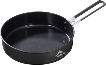 MSR ceramic skillet with fusion coating sizzling vegetables for quick camp meals