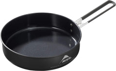 MSR ceramic skillet with fusion coating sizzling vegetables for quick camp meals