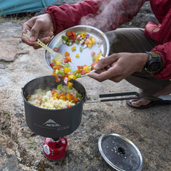 MSR Talon pot handle attached for secure, versatile cooking on trails.