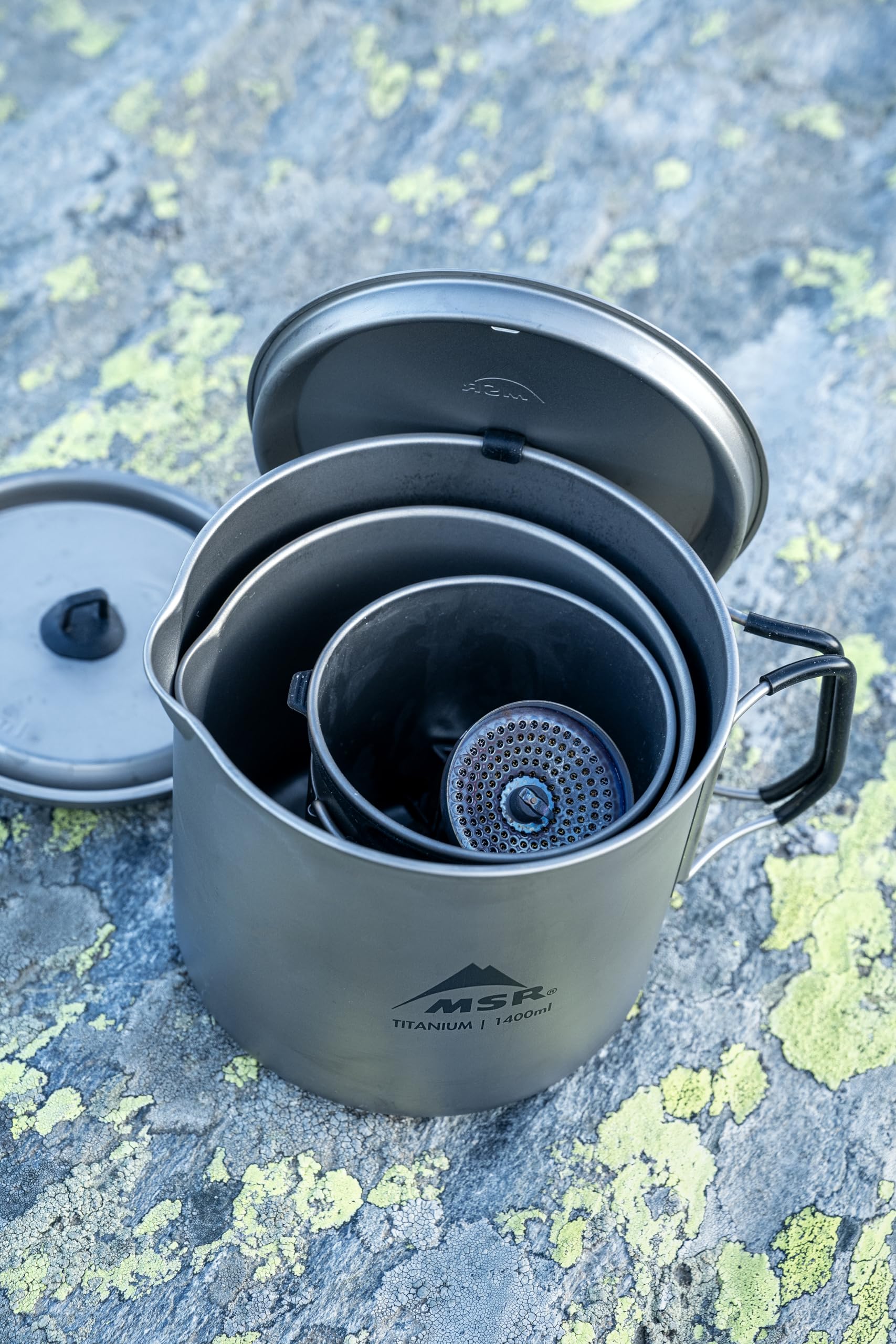 MSR Titan Kettle doubles as a camp mug and pot for boiling water.