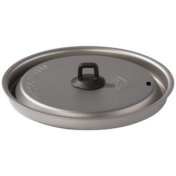 MSR Titan kettle pour-spout design enables controlled pouring into meals.