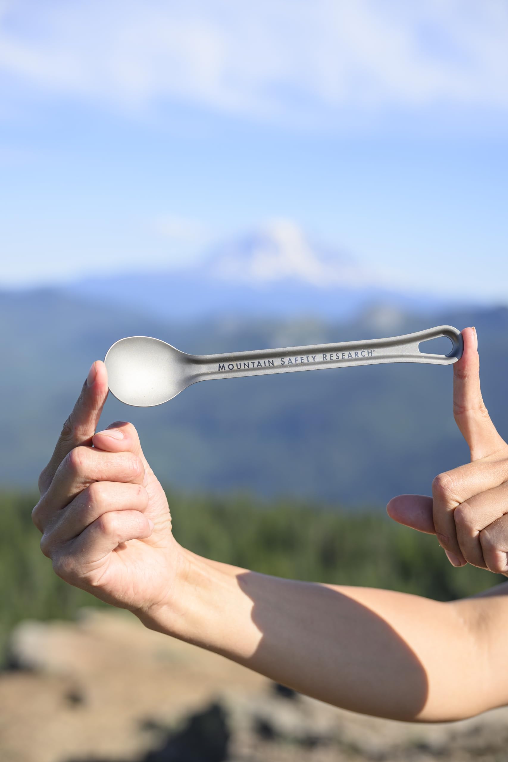 MSR Titan long spoon reaches deep into a freeze-dried meal pouch