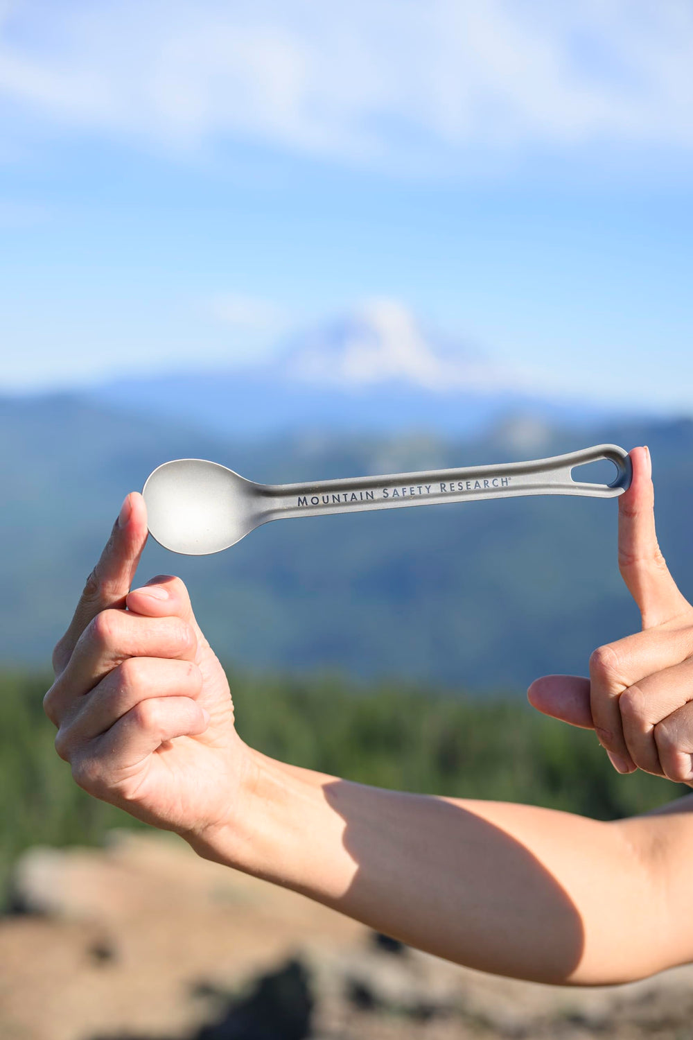 MSR Titan long spoon reaches deep into a freeze-dried meal pouch