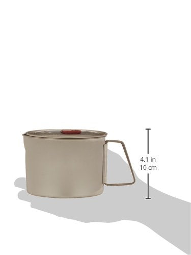 MSR Titan Ultralight Kettle pouring with a drip-free spout for precise pours.