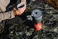 MSR Trail Mini Duo insulated grip highlights safe handling of hot pots outdoors.