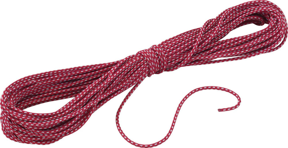 MSR Ultralight Utility Cord Kit spool reflecting light for night visibility and tarp setup.
